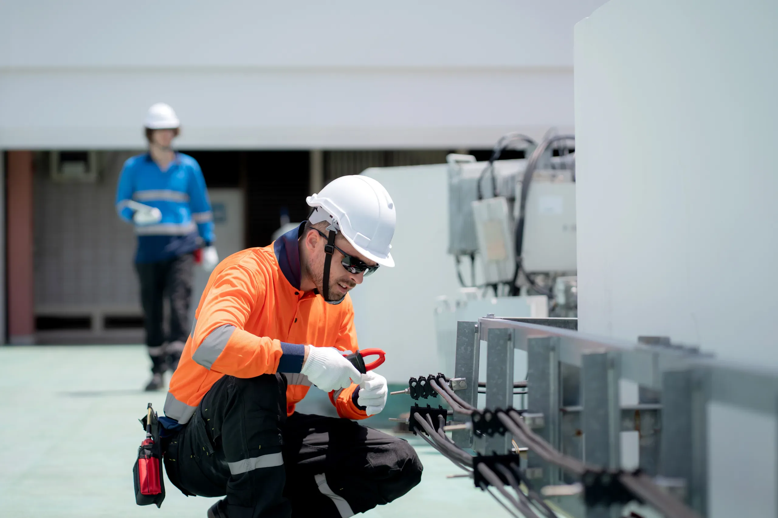 A technician carrying out building systems maintenance.